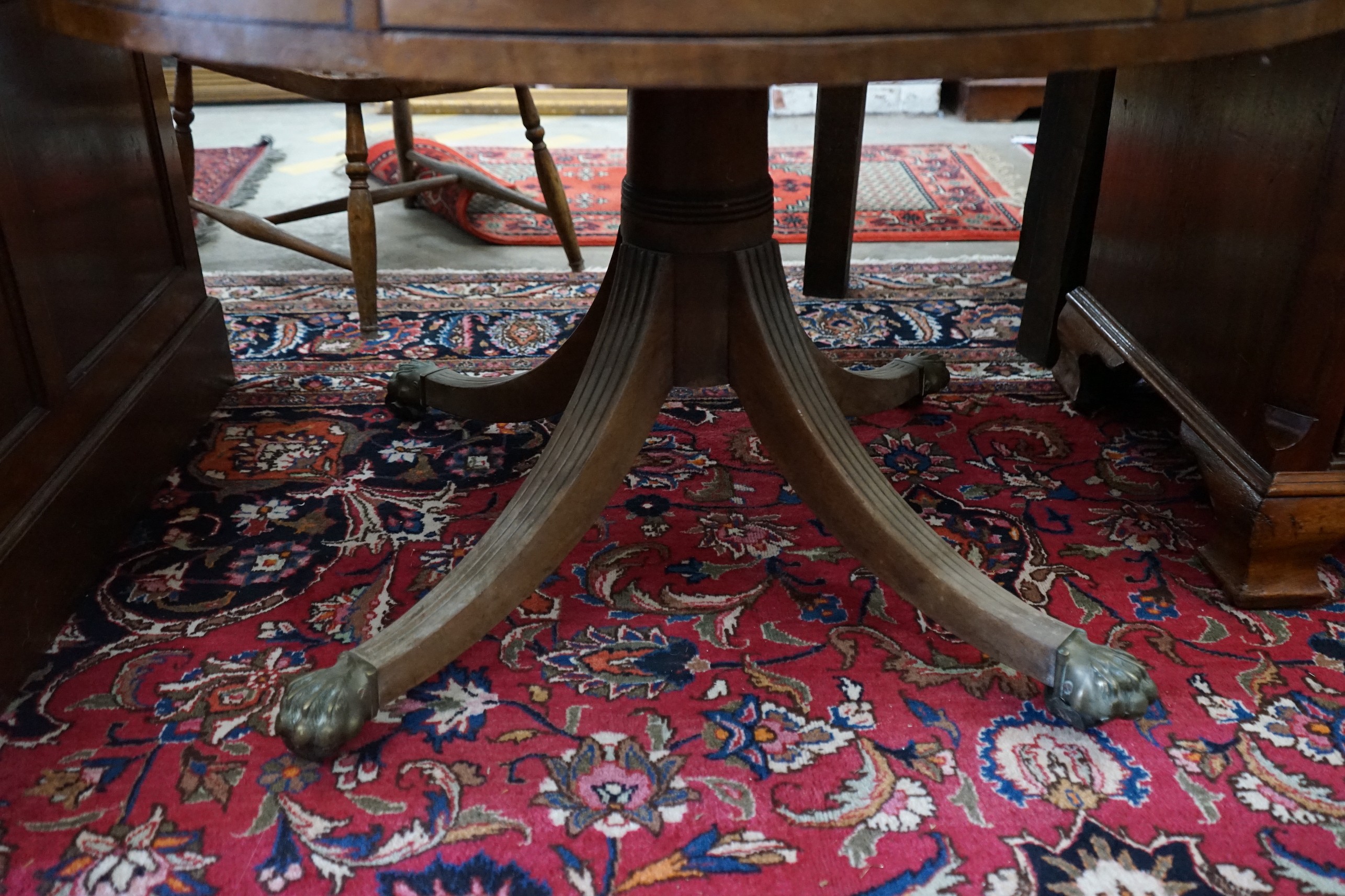 A 19th century circular drum table, diameter 106cm, height 74cm